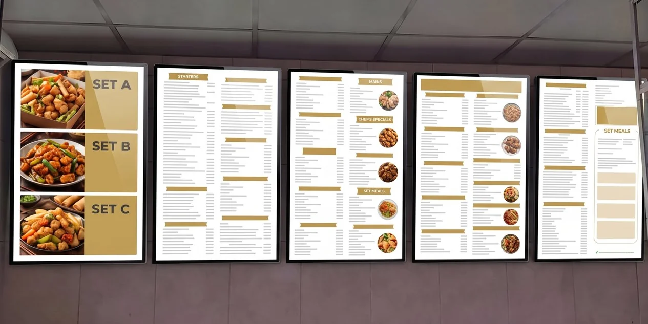 Row of five digital menu screens above a takeaway counter, the first selling set meals